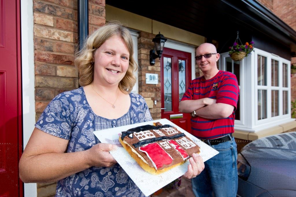 vicky-and-rob-at-the-front-of-their-4-bed-detached-house