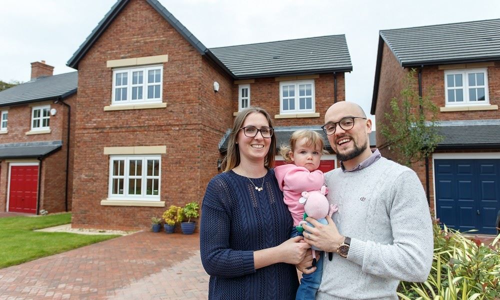David And Haylet In Front Of House Full Shot Website
