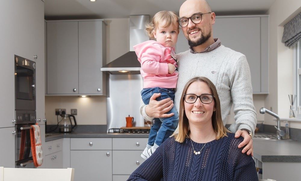 David And Hayley Sat At Table In Kitchen Website