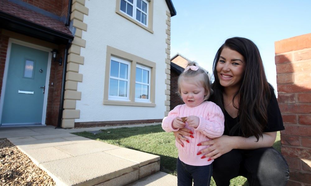 Customer outside their New build Home Stockton On Tees