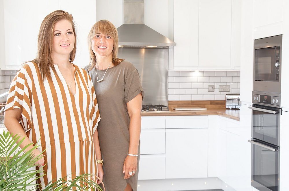 Lucy And Stacie In Kitchen