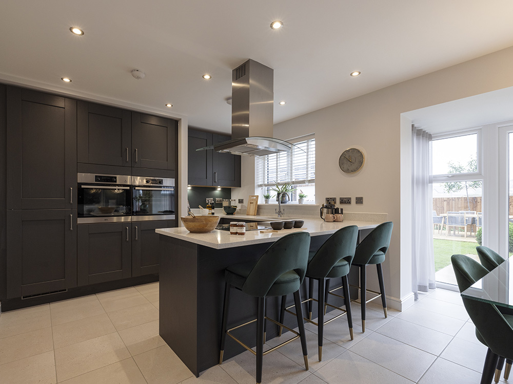 The kitchen in The Hewson show home at Waterside, Cottam