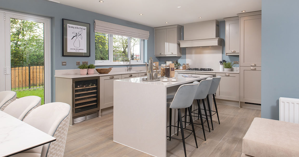 High specification designer kitchen with large kitchen island unit and integrated AEG appliances