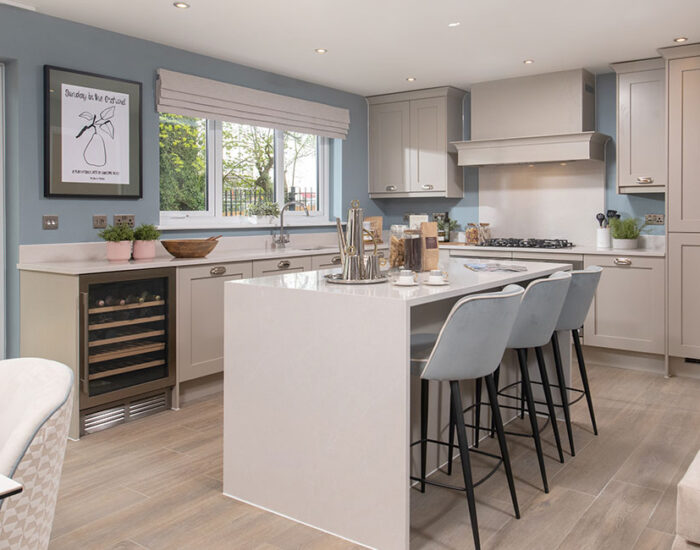 High specification designer kitchen with large kitchen island unit and integrated AEG appliances