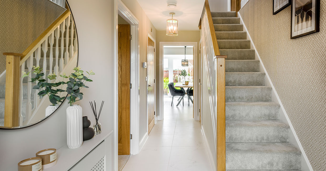 Large hallway with feature oak staircase