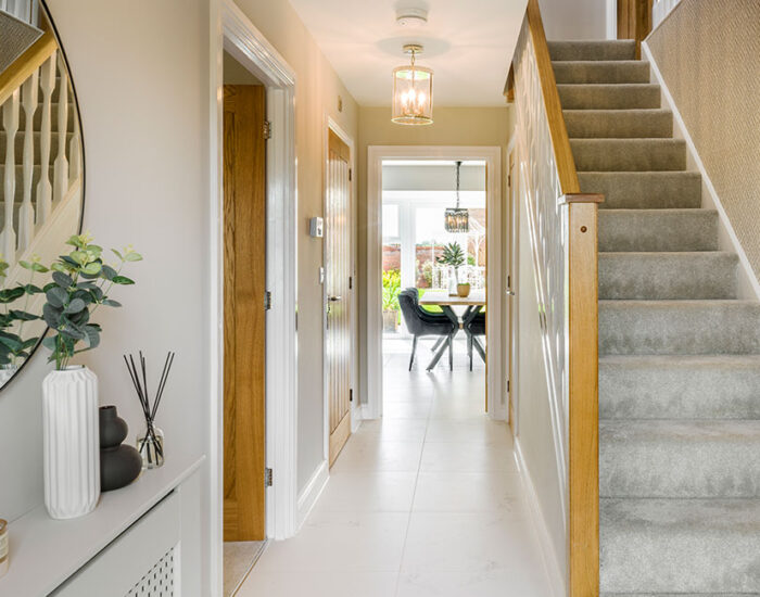 Large hallway with feature oak staircase