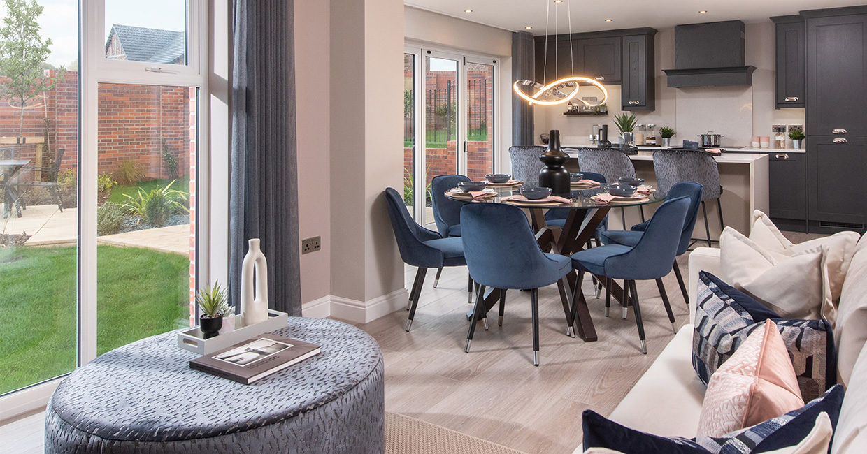 The spacious kitchen, dining and family area in The Robinson show home at Whins View