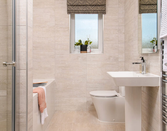 Porcelanosa tiles and rainfall shower to the spacious family bathroom