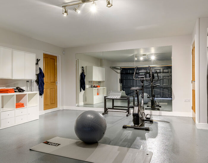 Double garage accessible from the hallway with room for a home gym