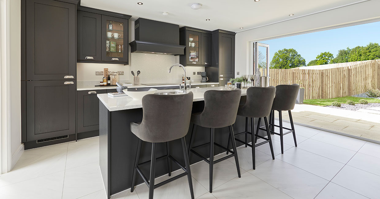 High specification designer kitchen with large kitchen island unit and integrated AEG appliances