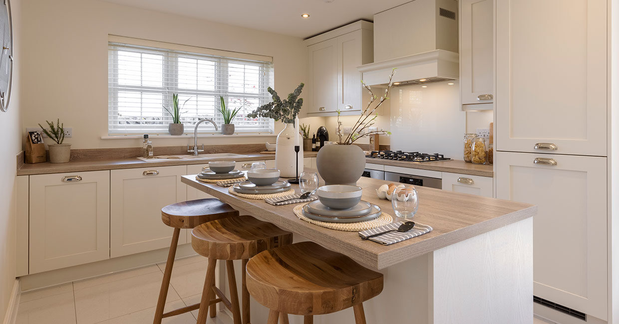 High specification designer kitchen with large island unit and integrated AEG appliances