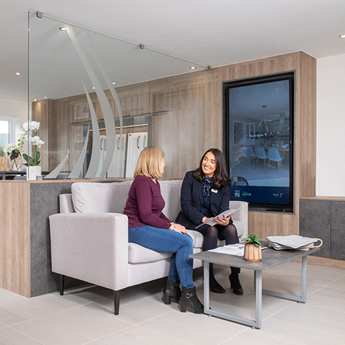 Image of marketing suite with customer and sales executive