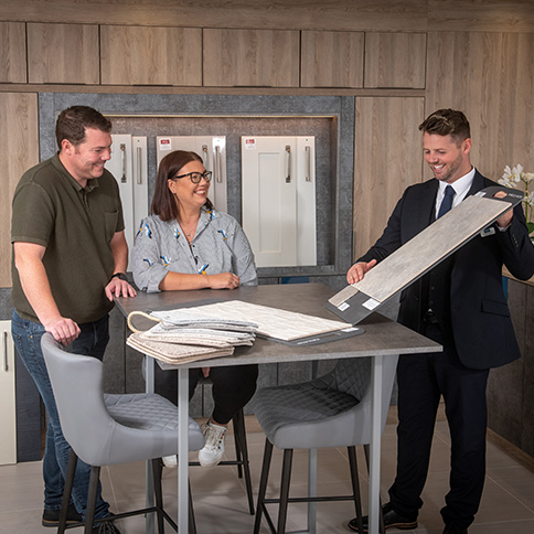 Customer choosing new home choices with the Story Homes' Sales Executive