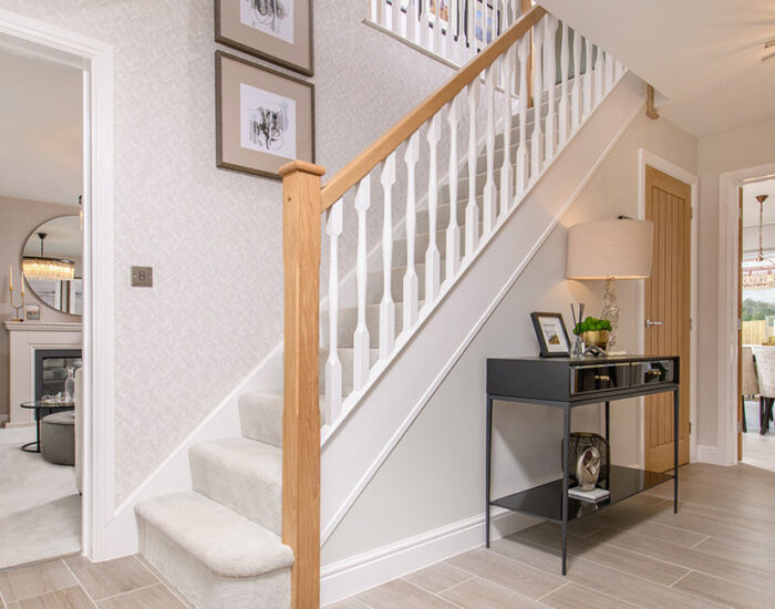 Spacious entrance hallways with feature oak staircase