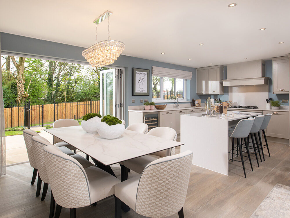The kitchen/dining/family area in The Cranford show home at Brigsteer Rise | Story Homes