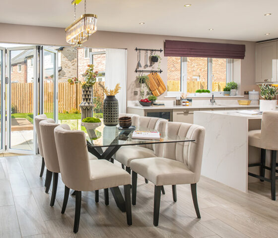 An open plan kitchen dining area in a Story Homes Charlton house type.
