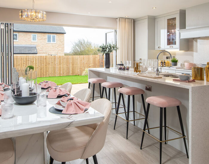 High specification designer kitchen with large kitchen island unit and integrated AEG appliances