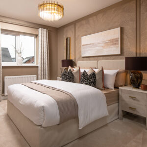 A view of a bedroom, including a double bed, from a Sanderson show home at Ashwood Grange, by Story Homes.