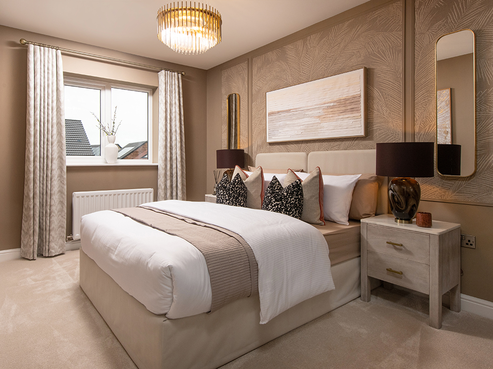 A view of a bedroom, including a double bed, from a Sanderson show home at Ashwood Grange, by Story Homes.