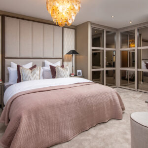 A view of a bedroom, including a double bed in a Milford show home at Ashwood Grange, by Story Homes.