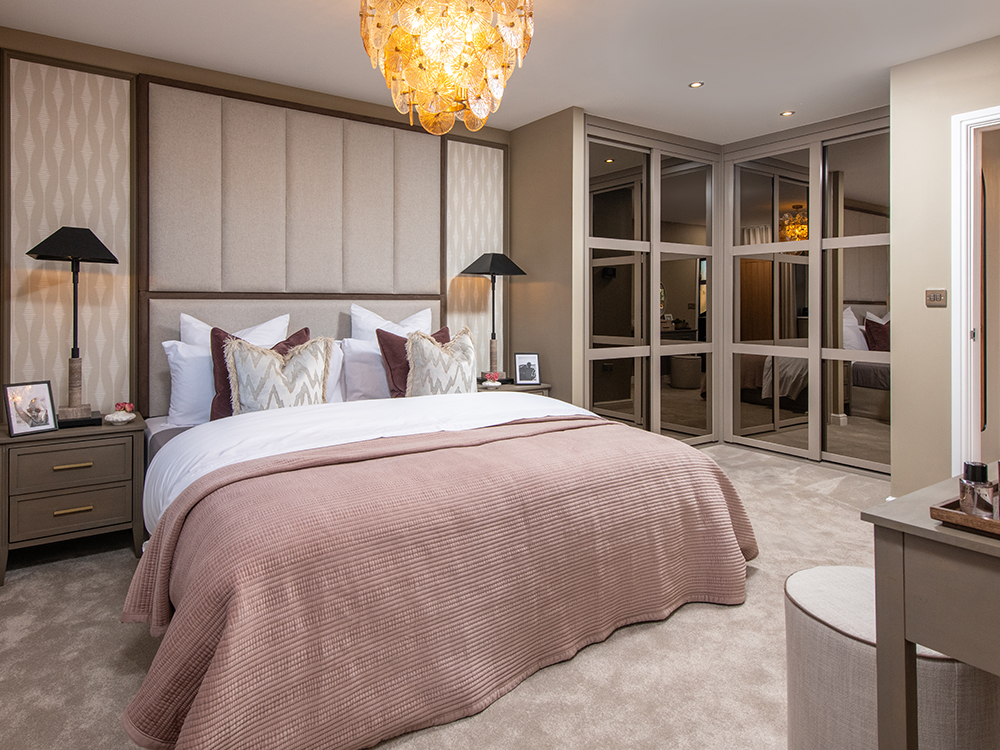 A view of a bedroom, including a double bed in a Milford show home at Ashwood Grange, by Story Homes.