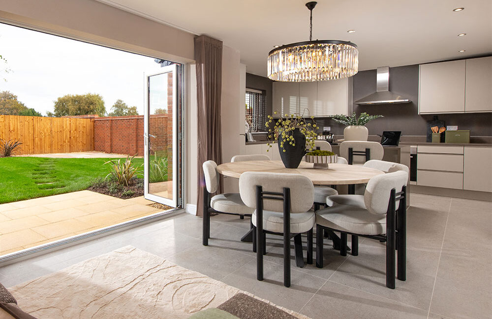 A view of the kitchen dining area in a Sanderson show home at Stonebrook Meadows by Story Homes.