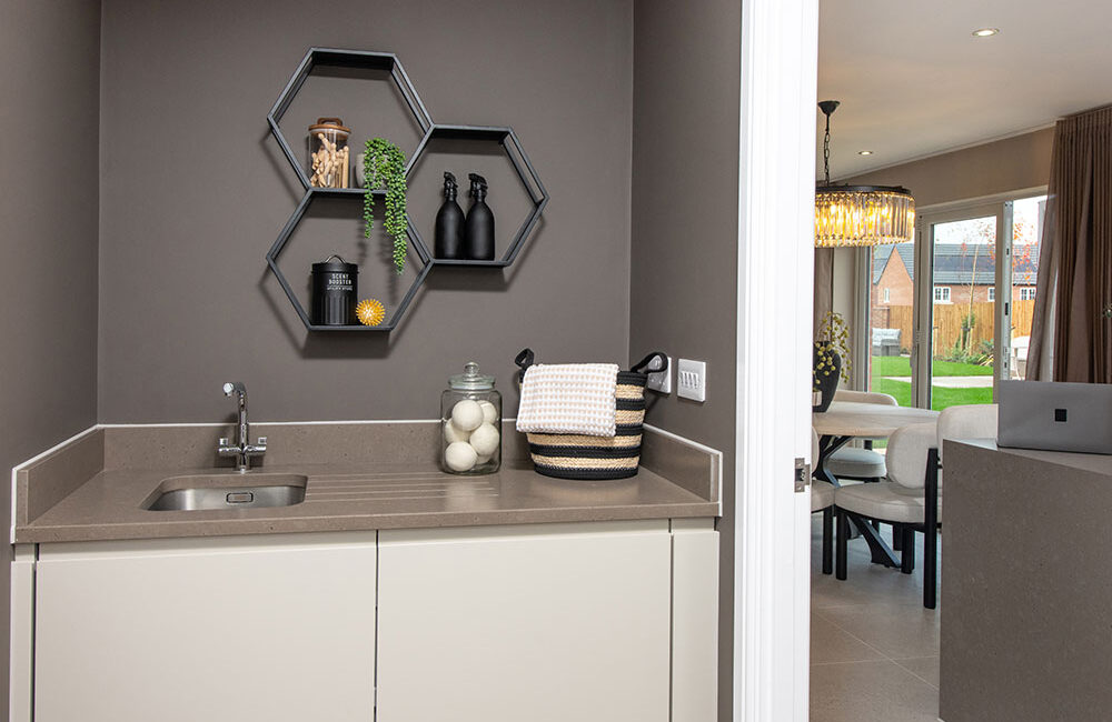 A view of the utility room in a Sanderson show home at Stonebrook Meadows by Story Homes.