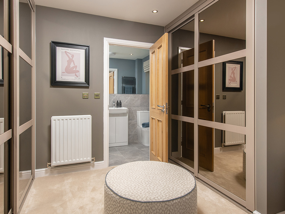 The dressing area in a main bedroom of a Charlton show home from Story Homes.