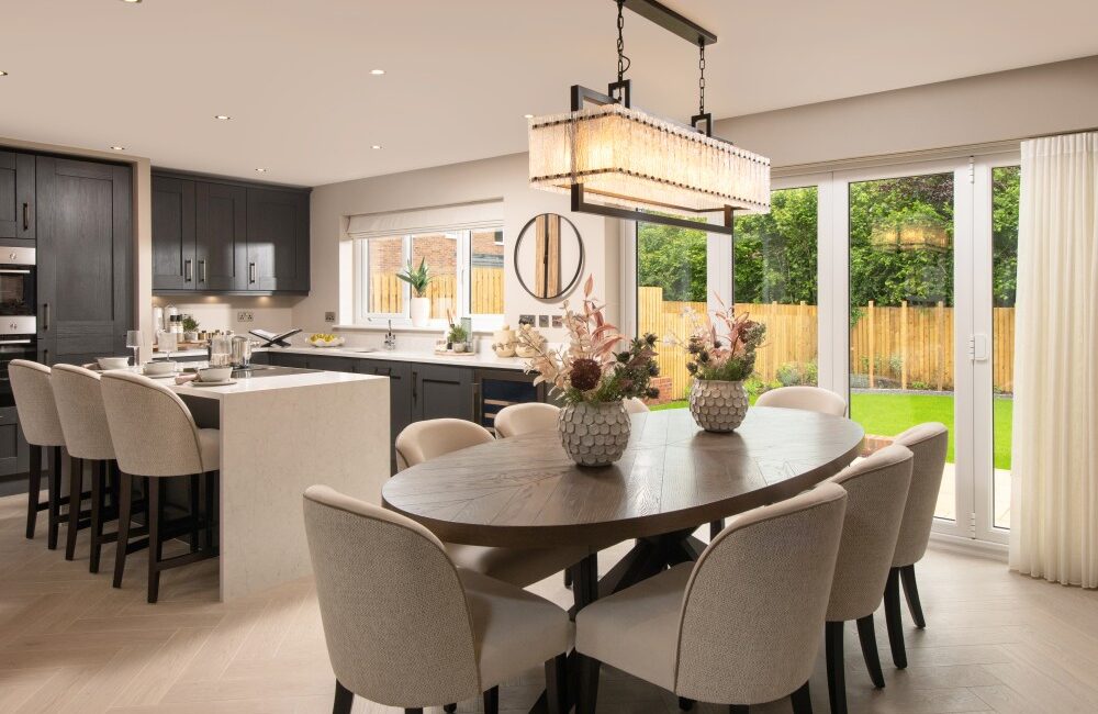 Kitchen dining table and bi-fold doors