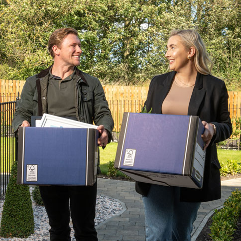Customers Moving Boxes into Their New Home