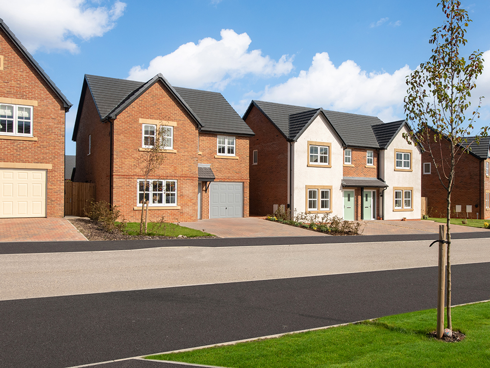 A street scene of new build houses at Tithe Gardens.