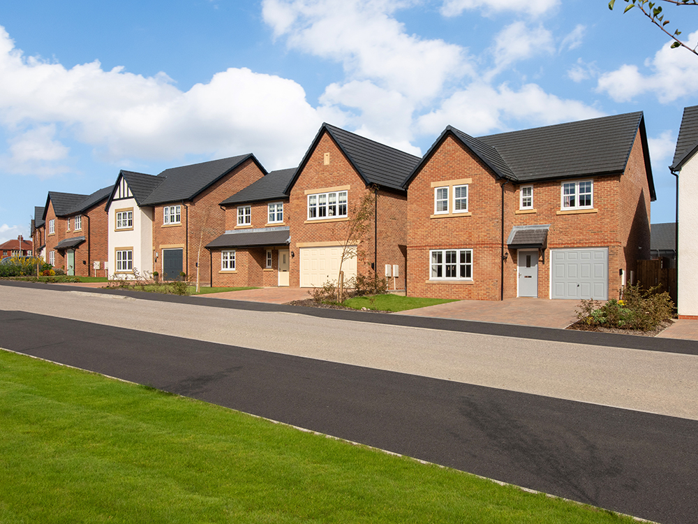 A street scene of new build houses at Tithe Gardens.