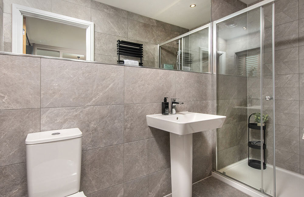 A view of an En-suite bathroom, in bedroom 2, in a Lawson show home at Stonebrook Meadows, Story Homes.
