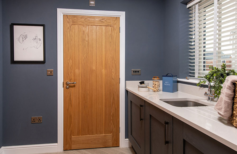 A view of the utility room in a Lawson show home at Stonebrook Meadows by Story Homes.