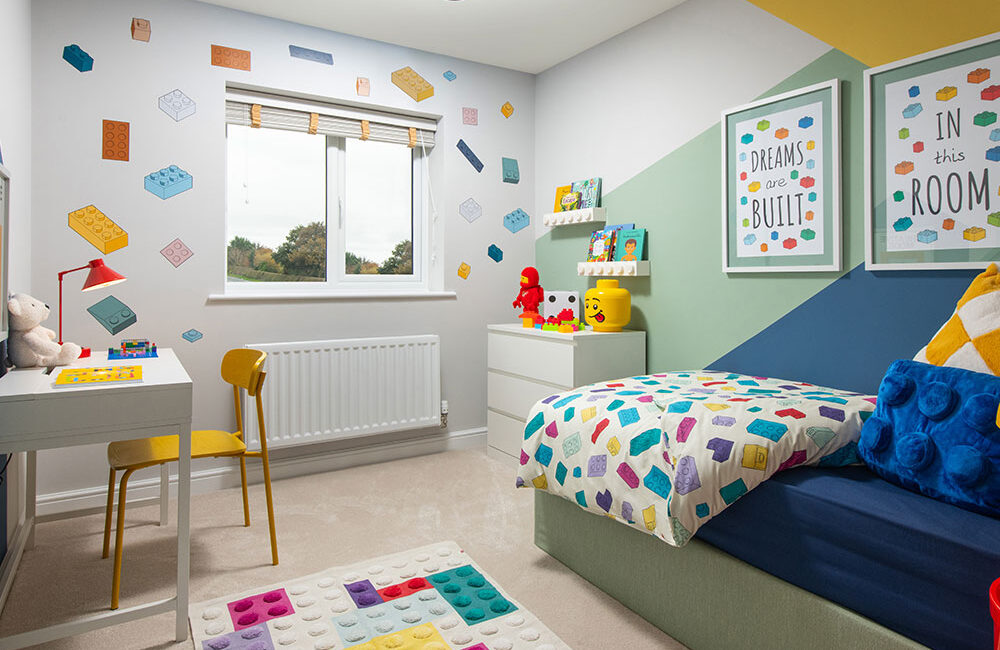 A view of bedroom 4, including a single bed, in a Sanderson show home at Stonebrook Meadows by Story Homes.