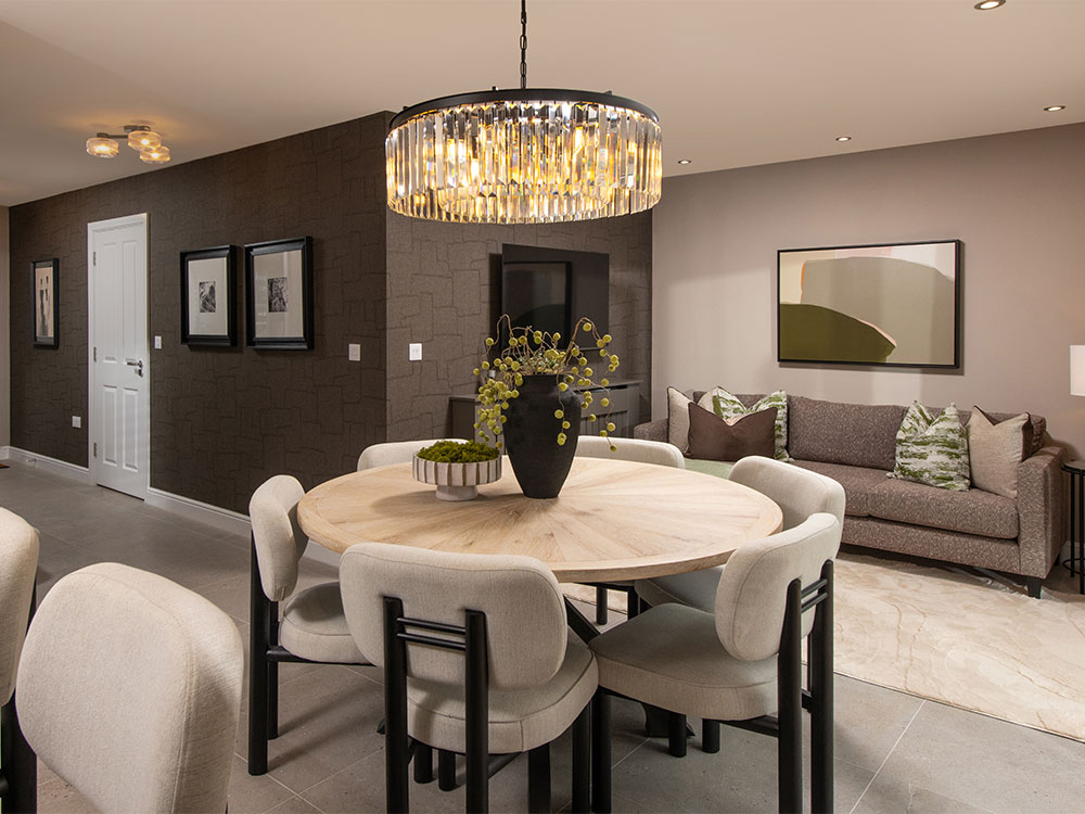 A view of the dining and family area in a Sanderson show home at Stonebrook Meadows, by Story Homes.