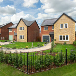 A view of the exterior, at the front of a show home at Stonebrook Meadows, by Story Homes.