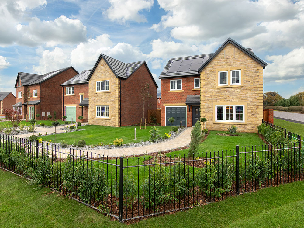 A view of the exterior, at the front of a show home at Stonebrook Meadows, by Story Homes.