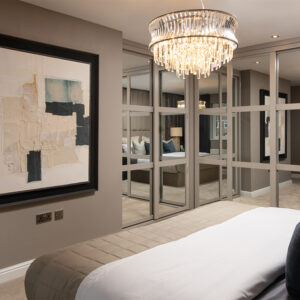 Main bedroom fitted wardrobes and light