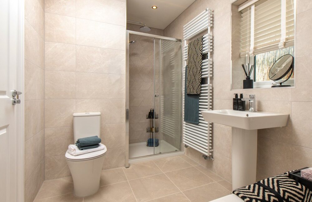 The Hartford main family bathroom with double ended bath and shower