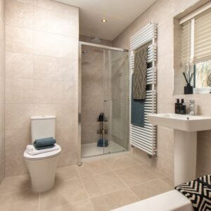 The Hartford main family bathroom with double ended bath and shower