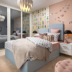 Bedroom three with double bed and fitted wardrobes