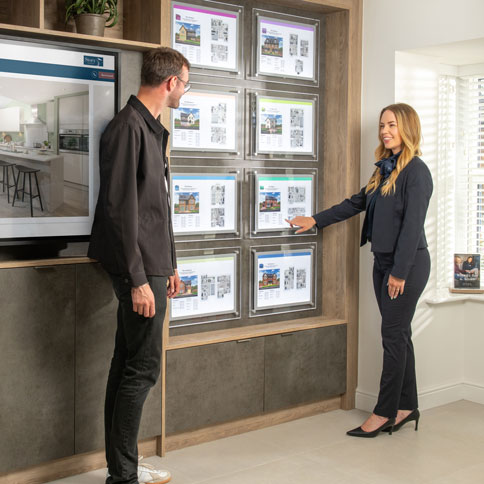 Sales Executive showing customer plots