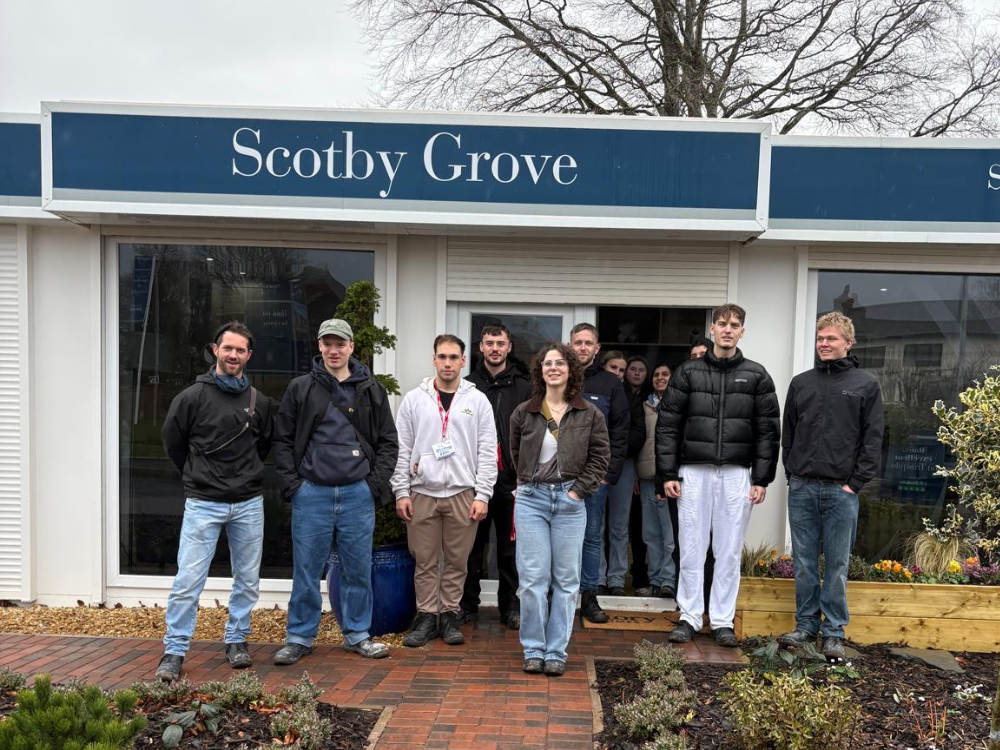 Students outside Scotby Grove sales cabin