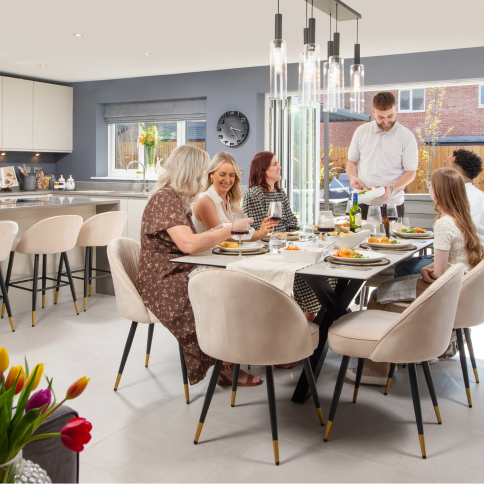 Family enjoying a meal in The Middleton at Longton Grange