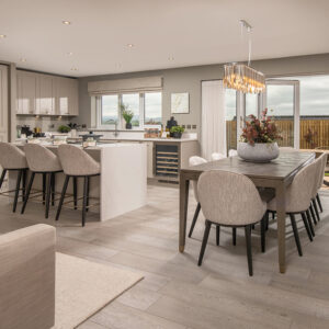 The Charlton kitchen with dining table and island
