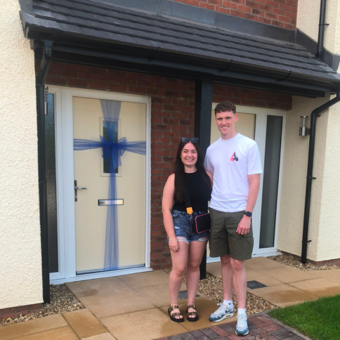 Chloe and Will outside their Mayford home at Scotby Grove